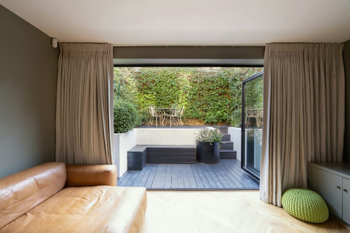 Contemporary Interiors and Preserved Details in an Early Victorian House 10 living area with garden access