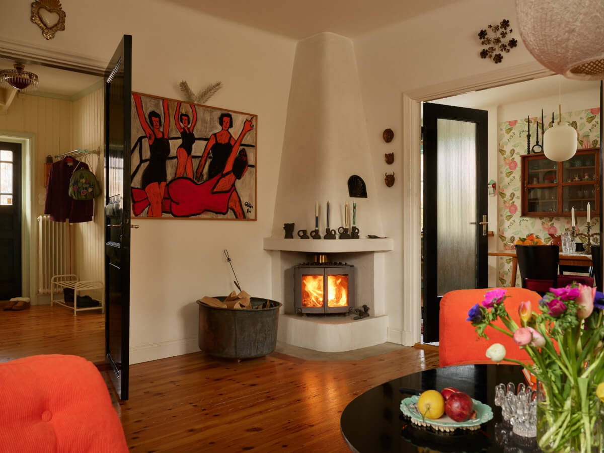 Colorful Interiors in a Wonderful Early 20th Century Swedish Villa 16 living room fireplace