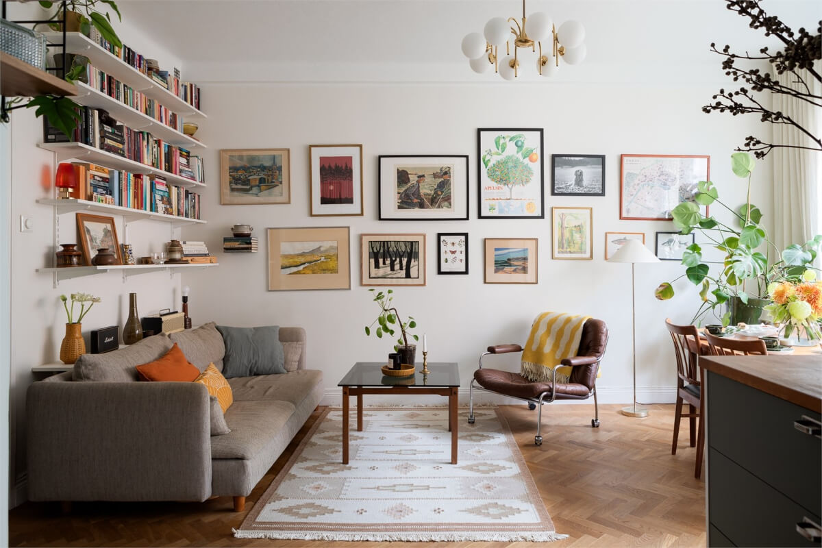 A Small Open-Plan Apartment with Midcentury Furniture 1 living room gallery wall bookshelves