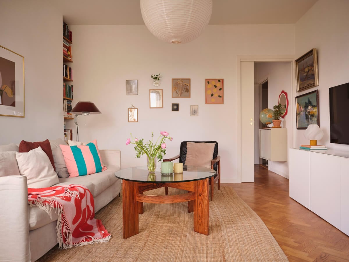 A Light Corner Apartment with Yellow Color Accents 6 living room herringbone parquet floor