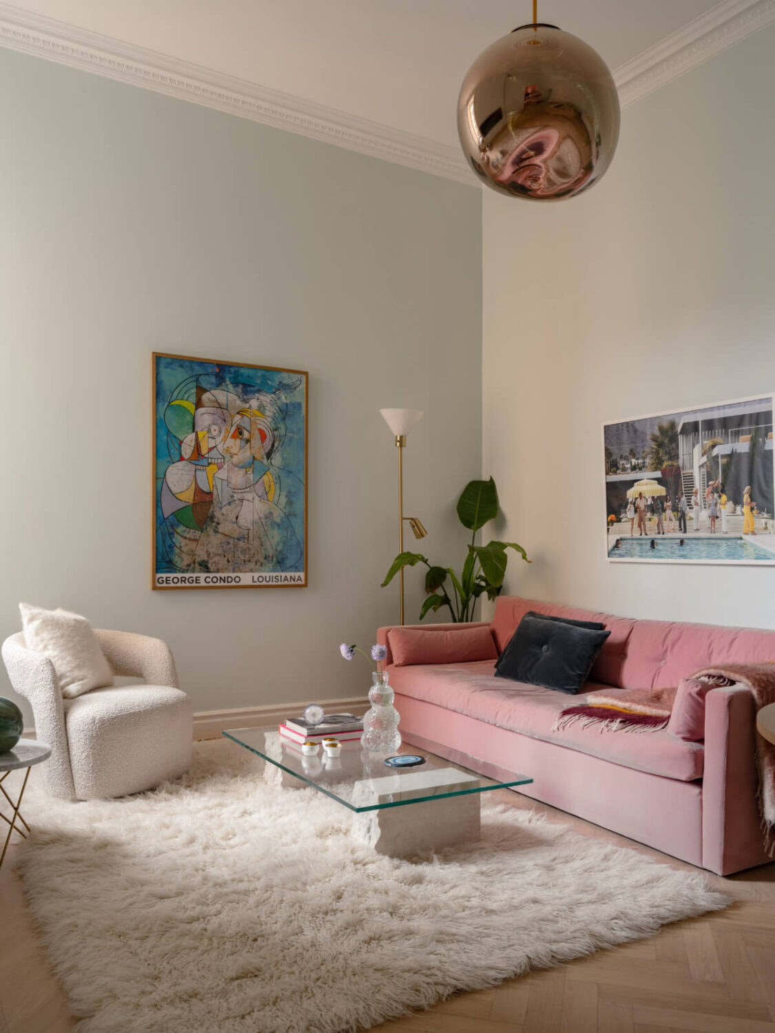 A Small Pink and Blue Apartment with High Ceilings in Stockholm 3 living room high ceiling pink sofa