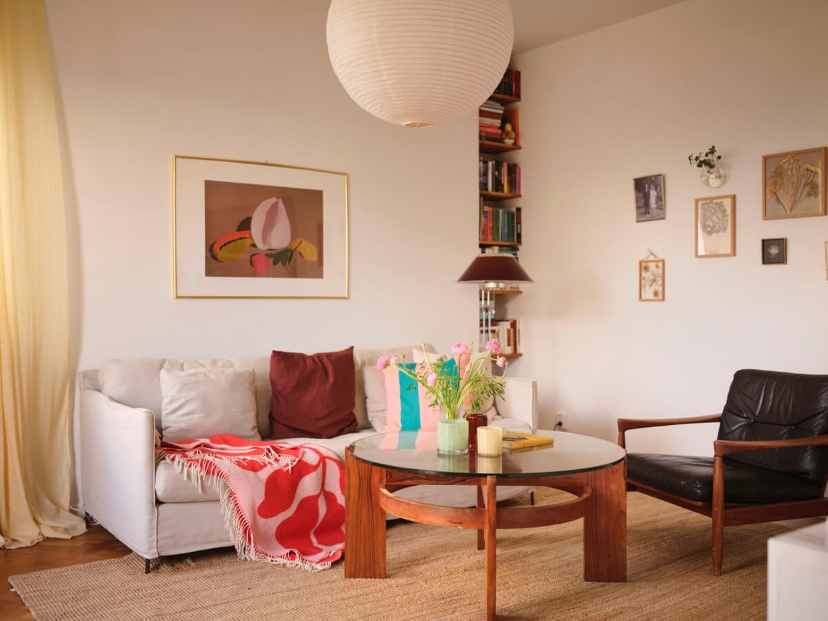 A Light Corner Apartment with Yellow Color Accents 5 living room jute rug bookshelves