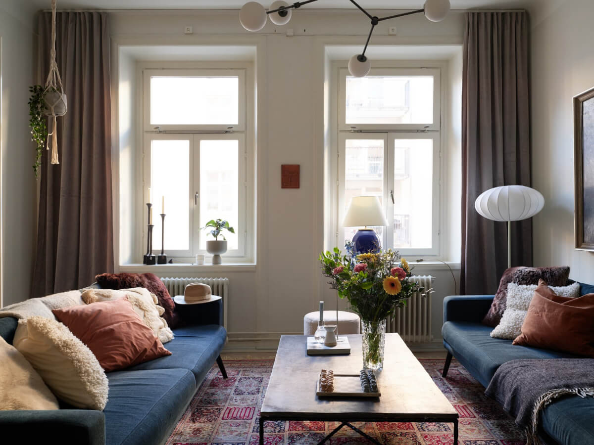 A Two-Bedroom Apartment with a Charming Bathroom 3 living room large rug