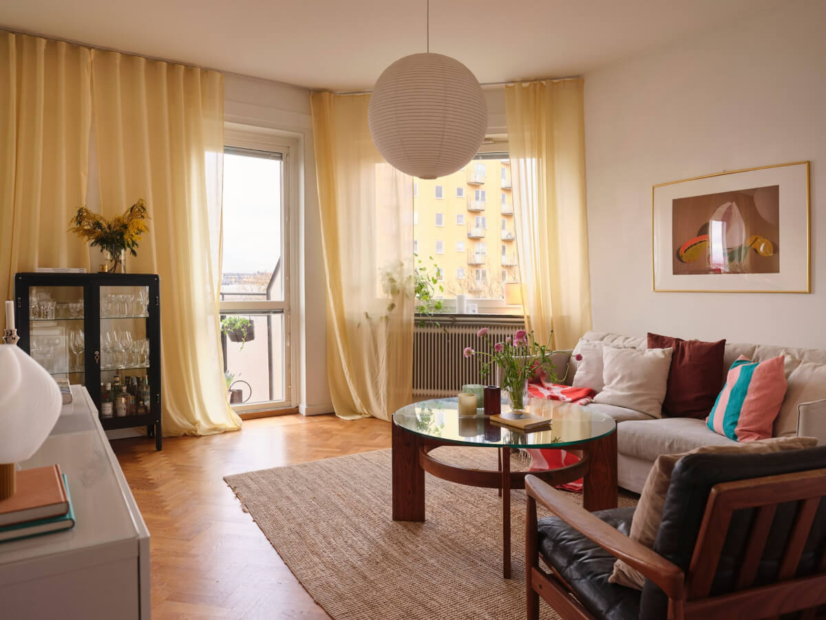 A Light Corner Apartment with Yellow Color Accents 1 living room picture window herringbone floor A Light Corner Apartment with Yellow Color Accents
