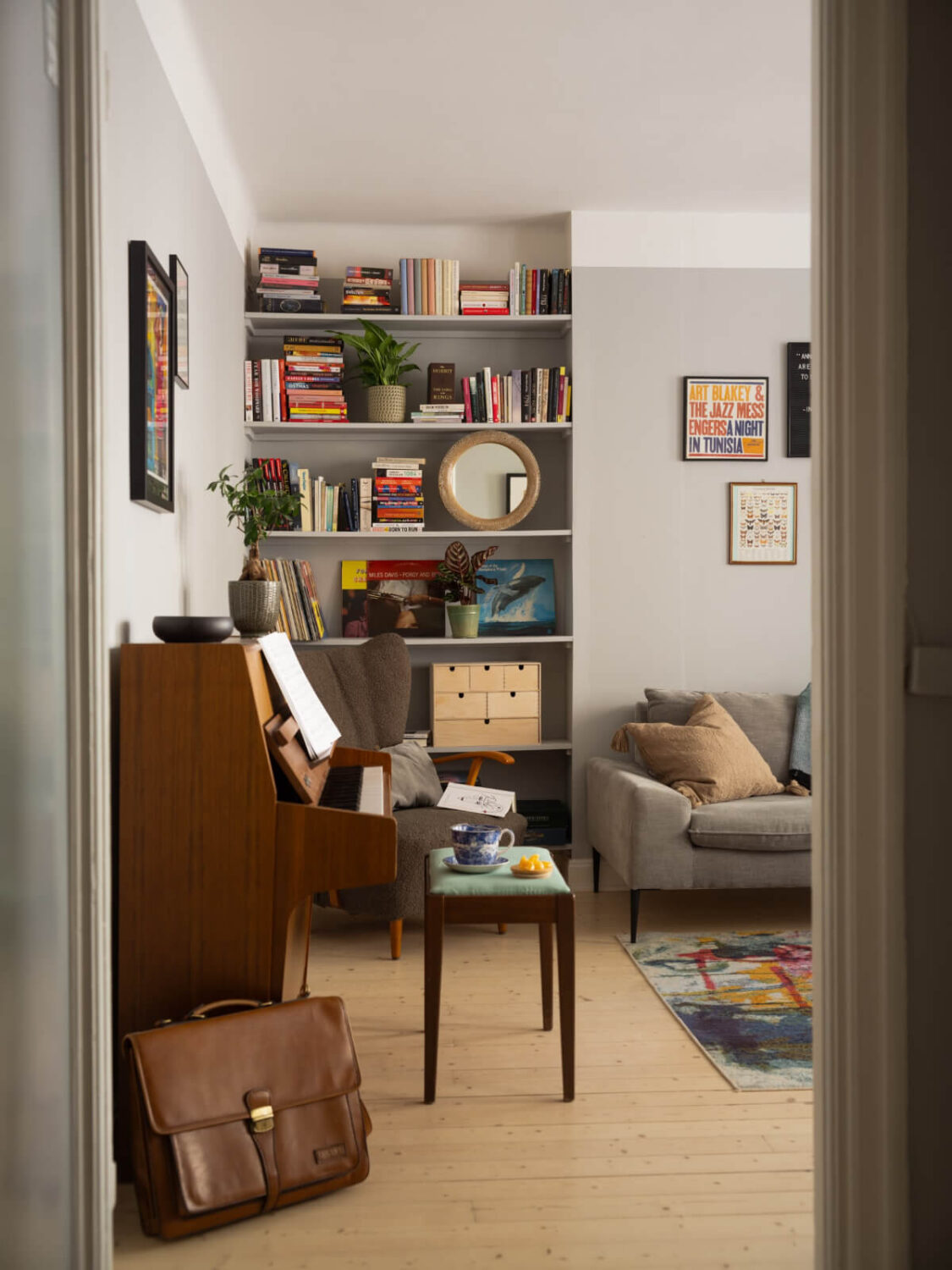 A Charming One-Bedroom Apartment in a 1920s Building 5 living room view gray walls