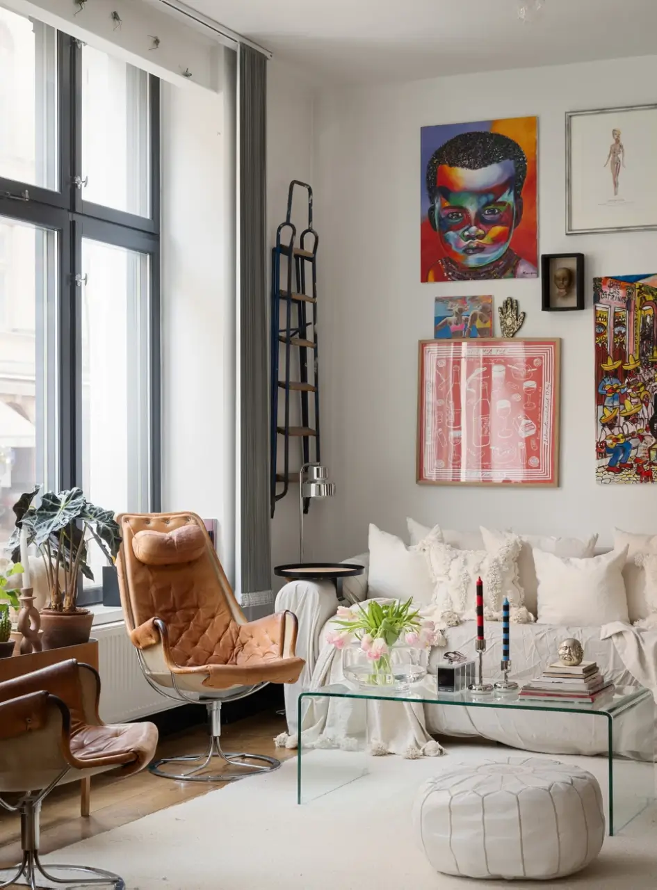 An Apartment with a Mirror Wall in a Former Stockholm Factory 4 living room white sofa art