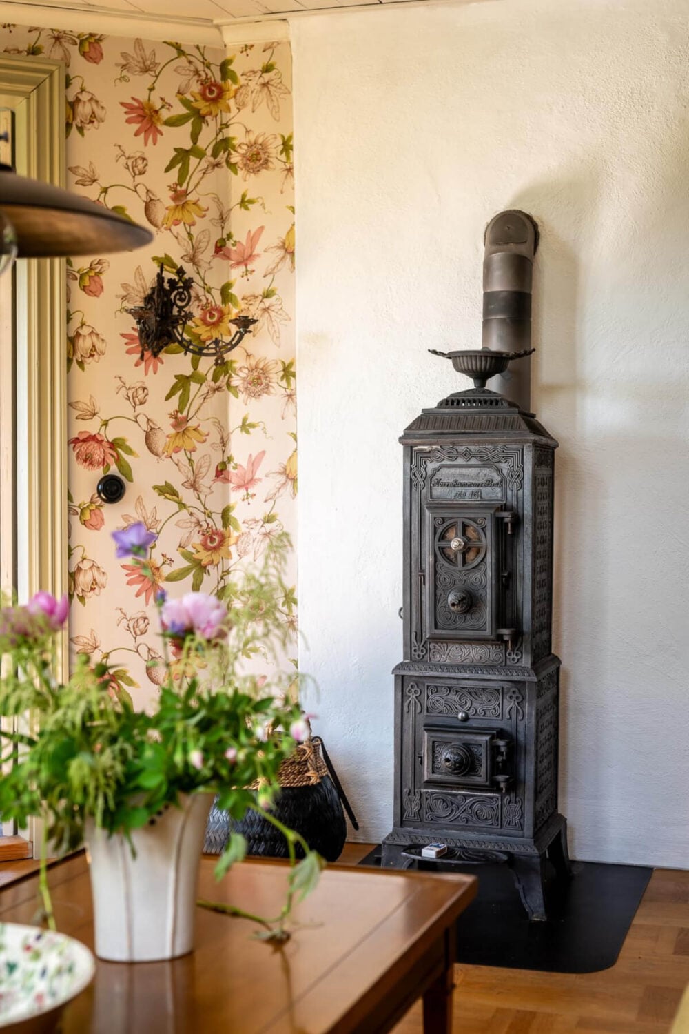 A Beautiful Historic Swedish Country House with Wallpapers 23 living room wood burner