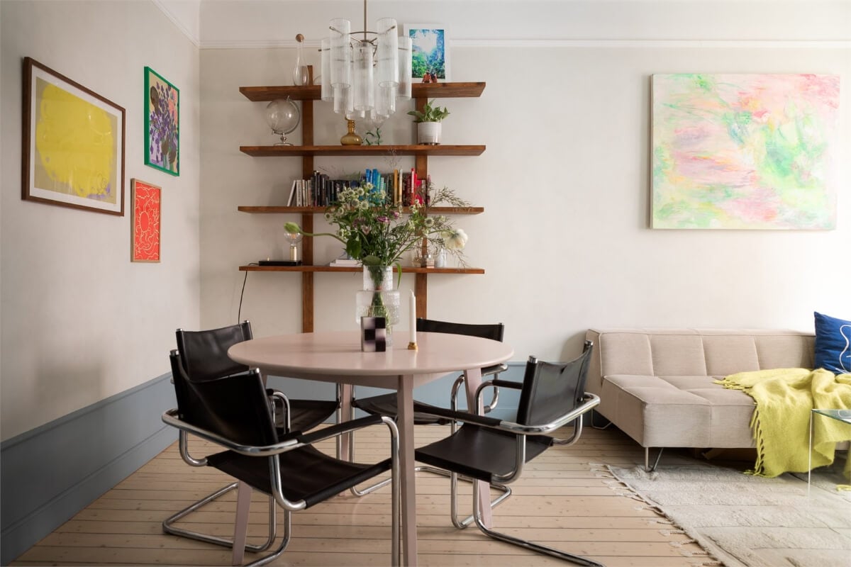 A Small Stockholm Apartment with a Blue Shaker Kitchen 1 living room wooden floor gray-blue skirting boards