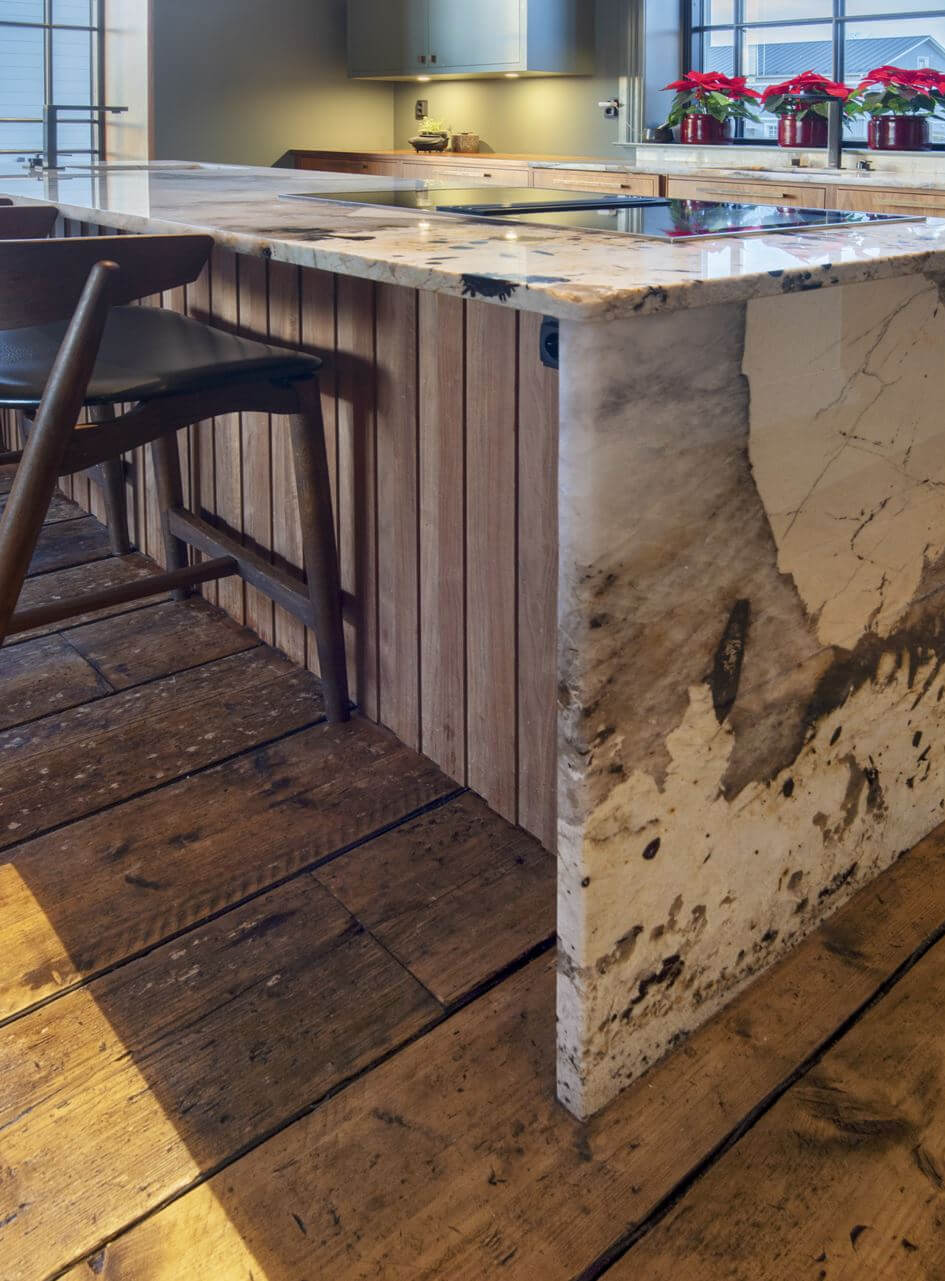 English Manor Style Interiors in a New Swedish Home with Lake Views 14 marble kitchen island rustic floorboards