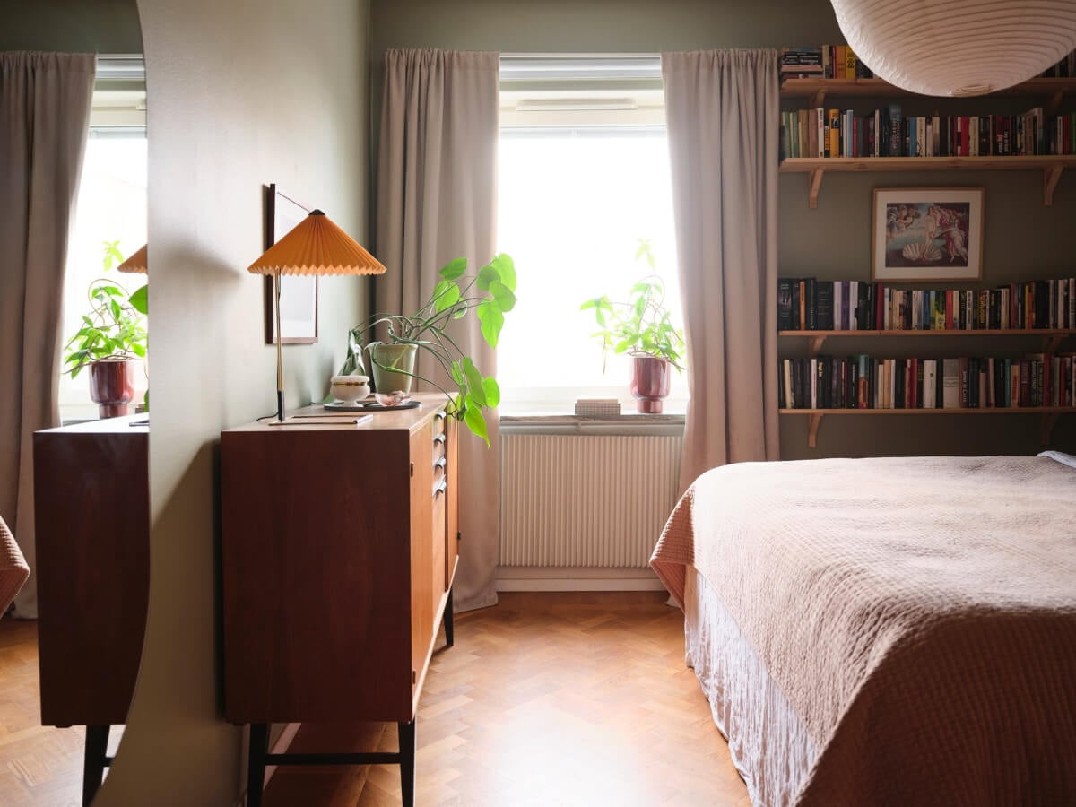 A Light Corner Apartment with Yellow Color Accents 21 midcentury cabinet bedroom