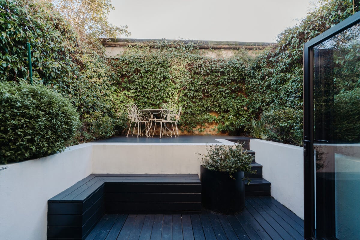 Contemporary Interiors and Preserved Details in an Early Victorian House 11 modern garden