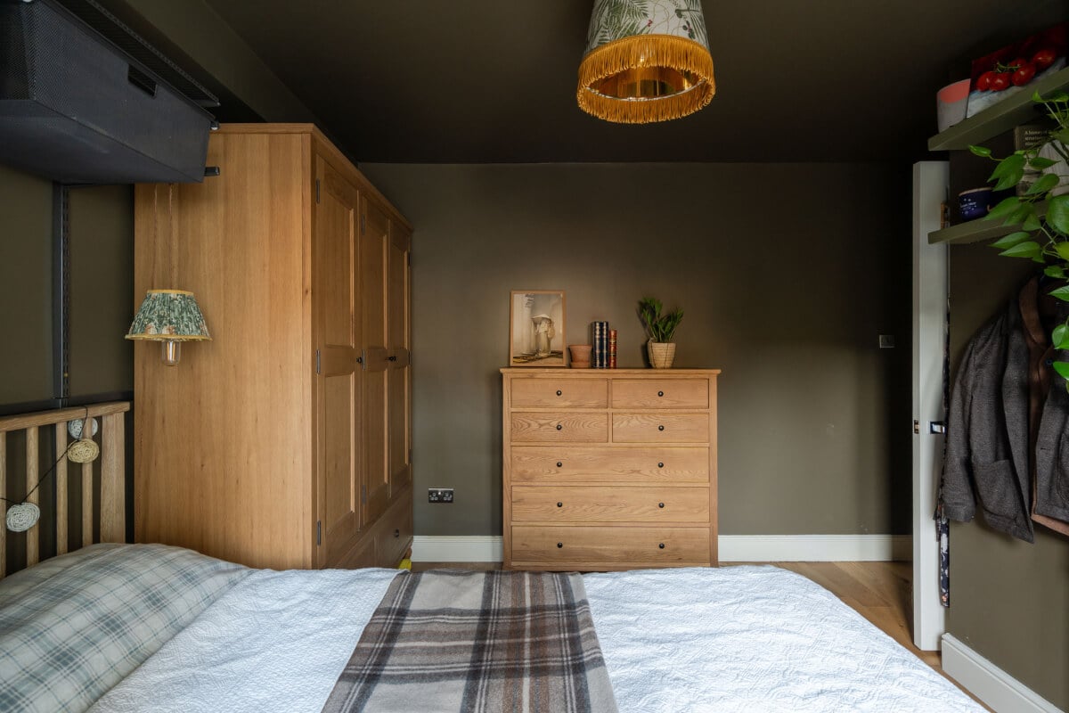 A Muted Color Palette in a Charming Ground Floor Apartment 15 moody bedroom