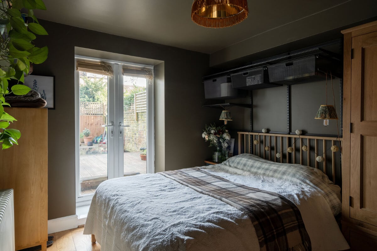 A Muted Color Palette in a Charming Ground Floor Apartment 13 moody dark green bedroom