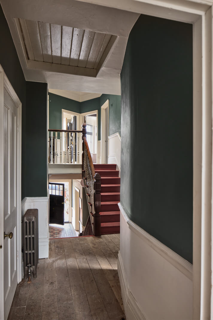Grand Proportions and Period Details in a Victorian Villa 12 moody hall rustic floorboards red staircase