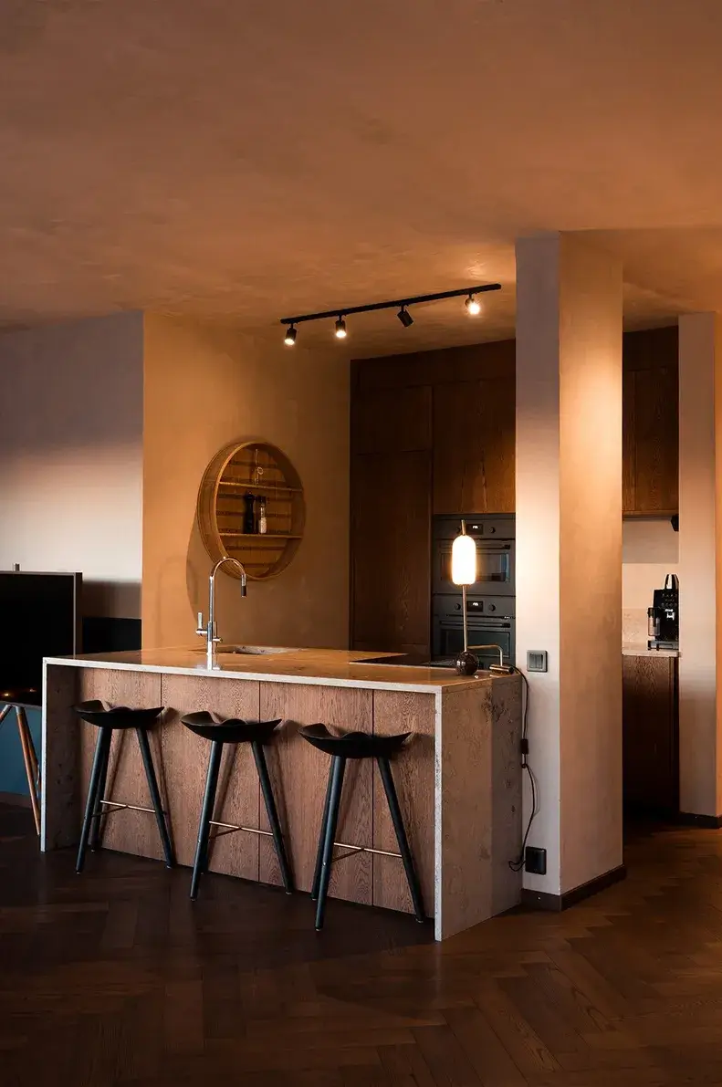 A Top Floor Swedish Apartment with a Huge Balcony 16 oak kitchen evening herringbone floor