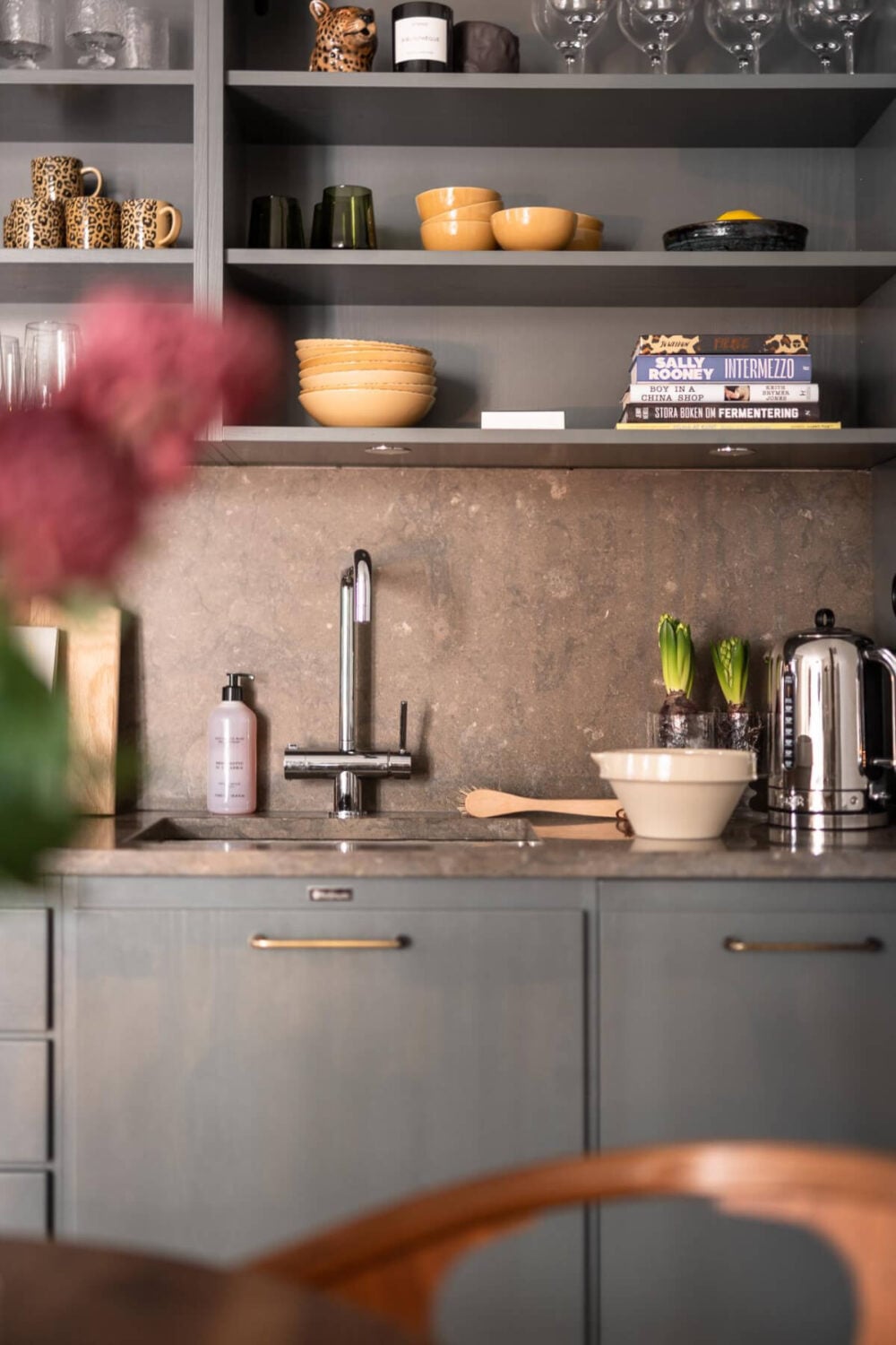 A Small Ground Floor Apartment Decorated in Gray Tones 8 open cabinets kitchen