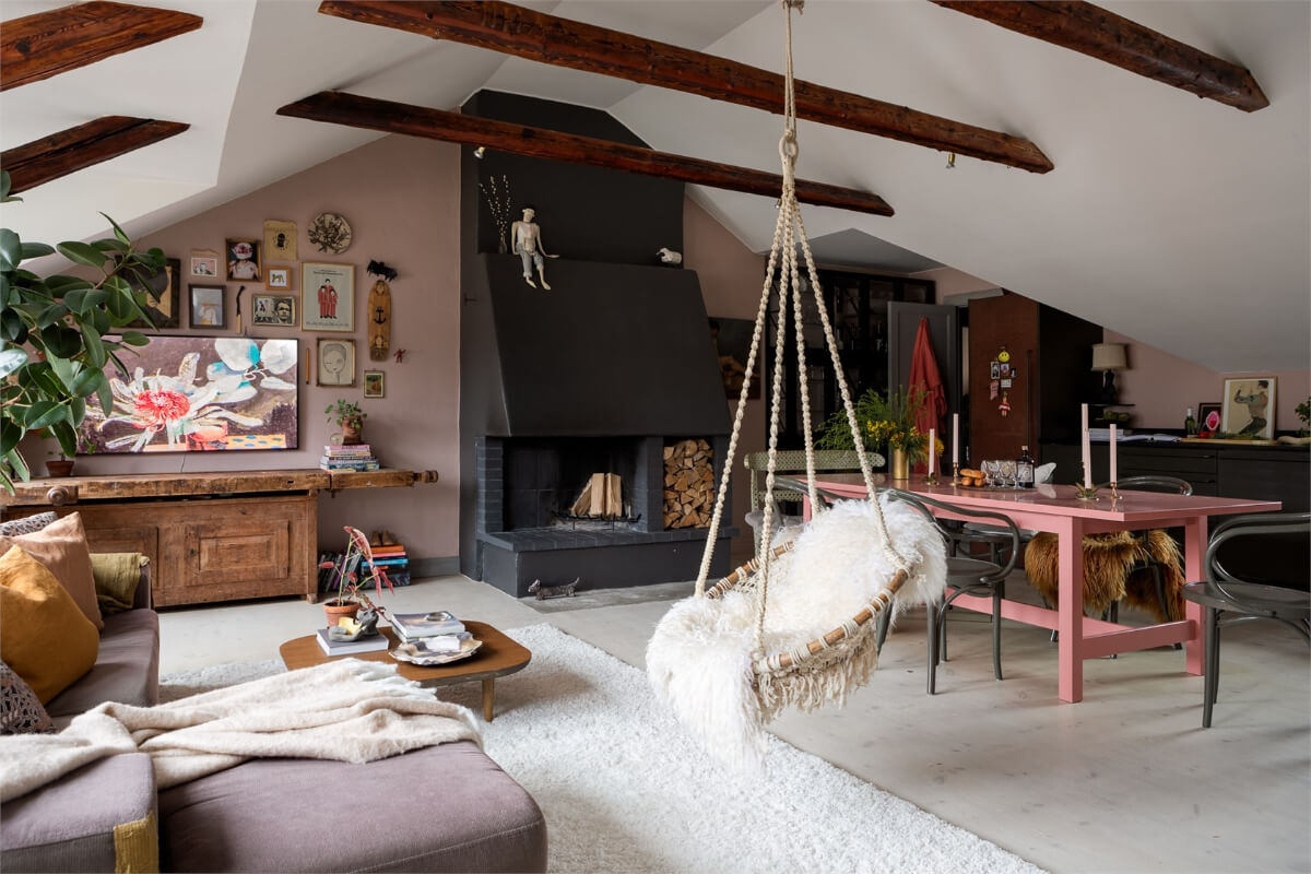 Best of 2025: Living Rooms 12 open plan attic living space wooden beams pink dining table