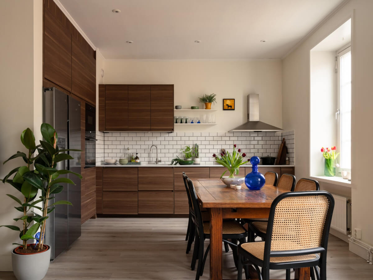 A Pink and Orange Bedroom in a Light Stockholm Apartment 10 open plan kitchen large dining table