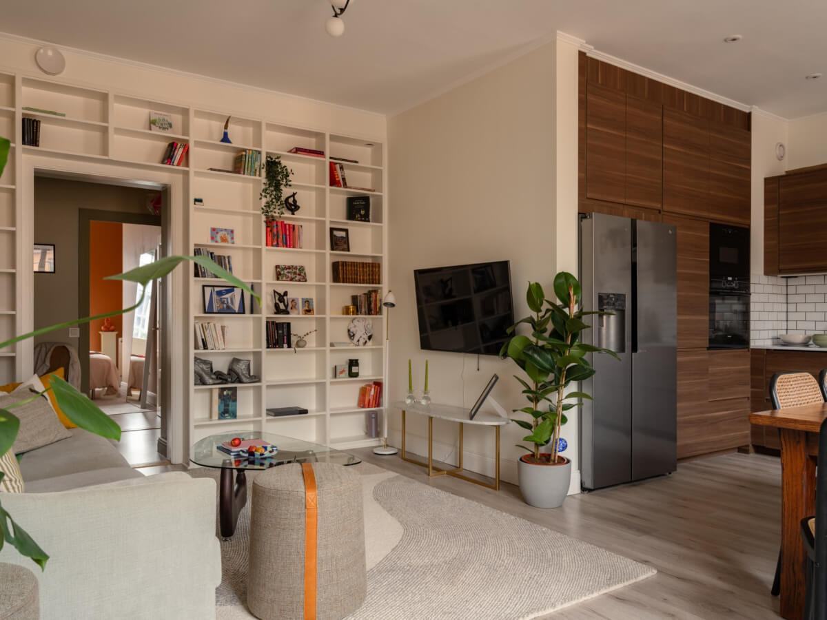 A Pink and Orange Bedroom in a Light Stockholm Apartment 5 open plan living area