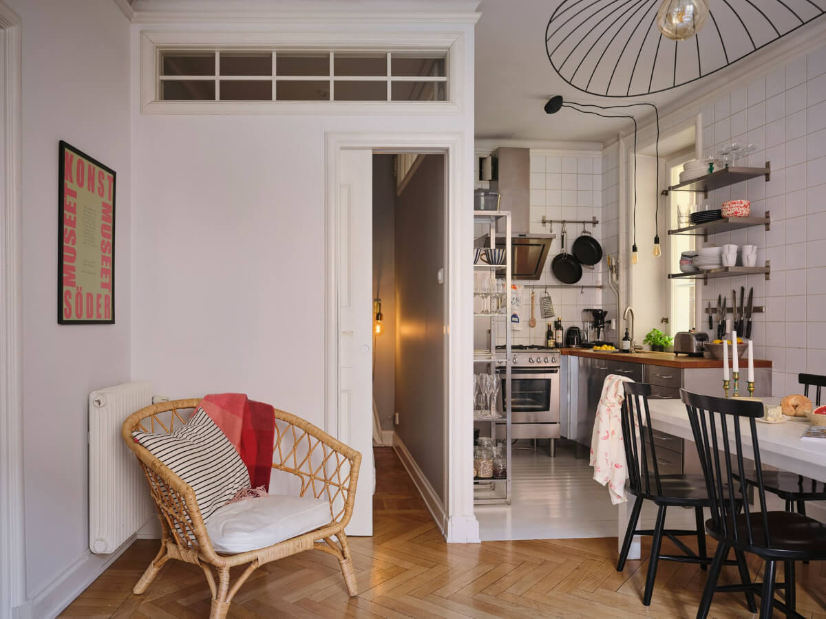 A Small Apartment with an Industrial Stainless Steel Kitchen 12 open plan living room kitchen small apartment