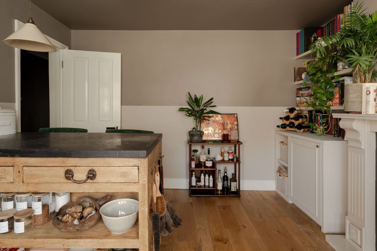 A Muted Color Palette in a Charming Ground Floor Apartment 7 open plan living room kitchen three toned walls ceiling