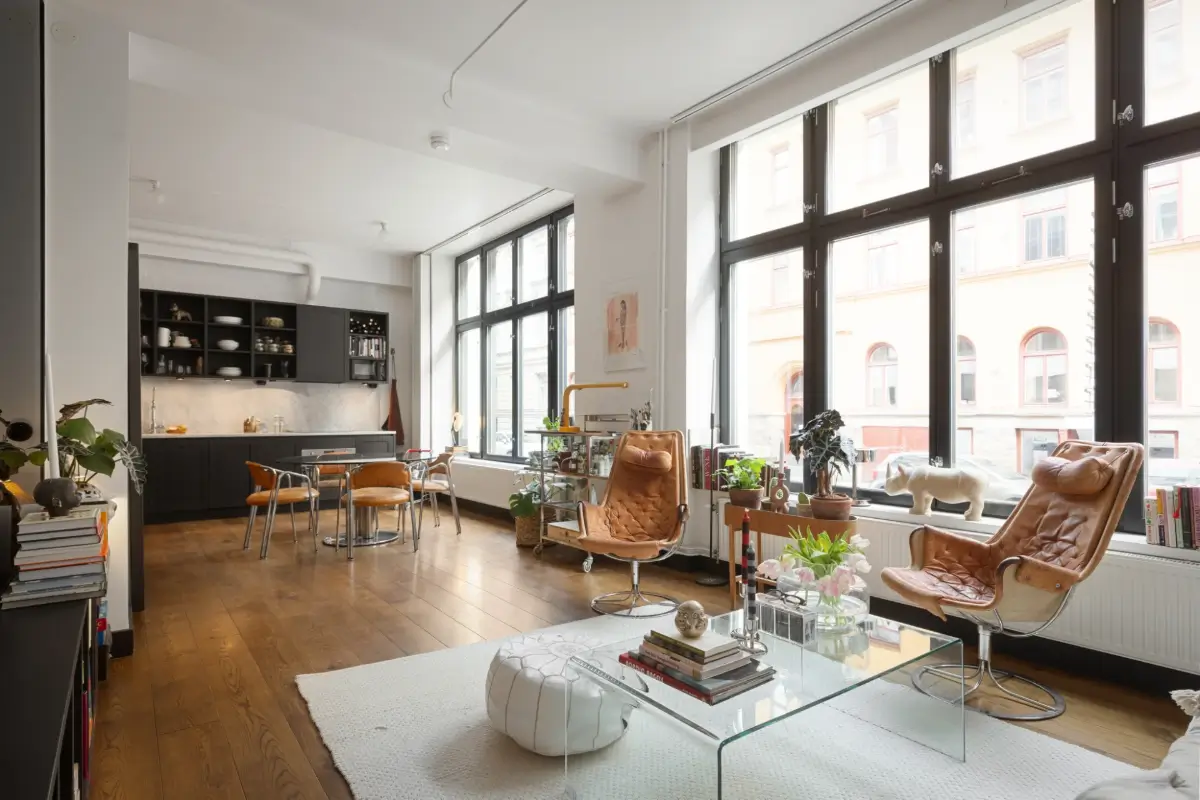An Apartment with a Mirror Wall in a Former Stockholm Factory 8 open plan living space old industrial building