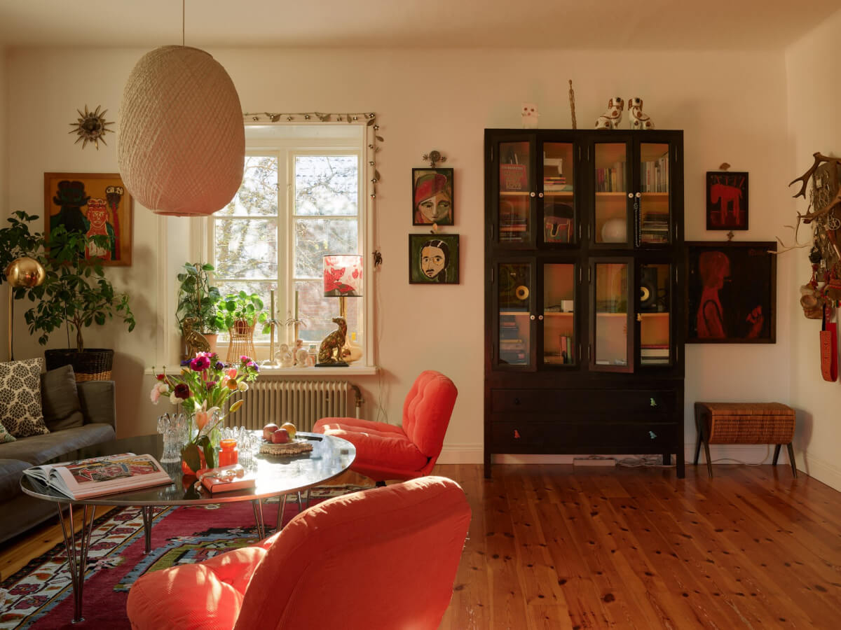 Colorful Interiors in a Wonderful Early 20th Century Swedish Villa 17 orange ikea chairs living room