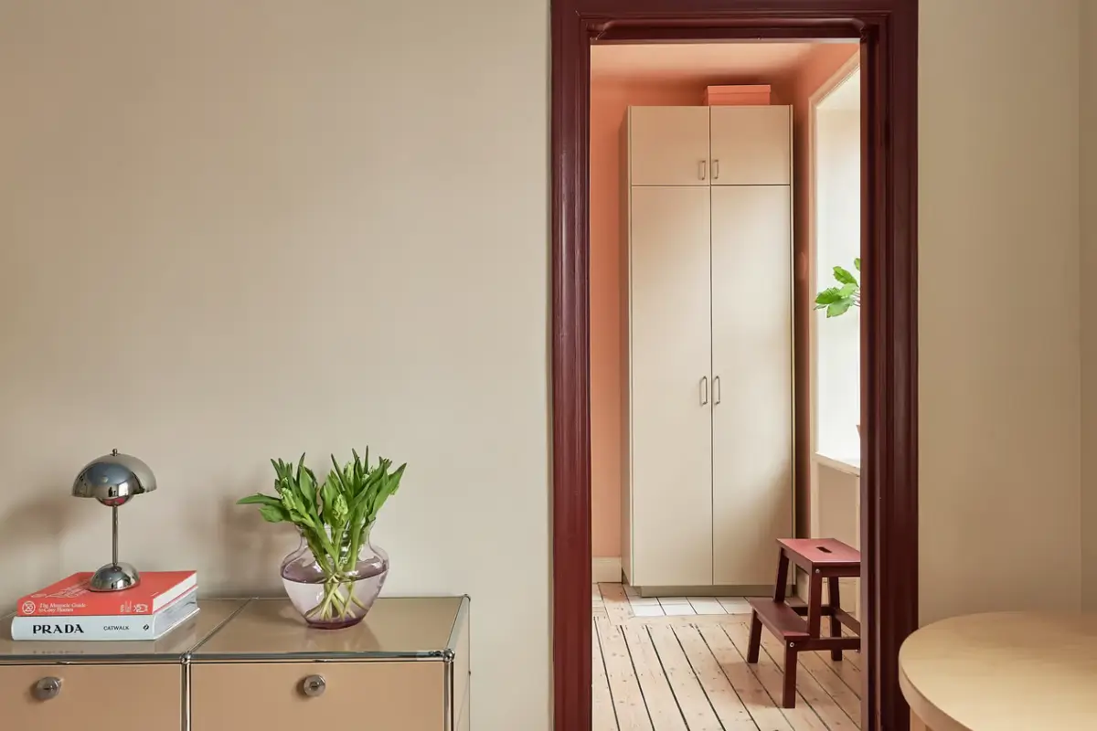 A Colorful Studio Apartment in Stockholm 7 painted doorframe A Colorful Studio Apartment in Stockholm