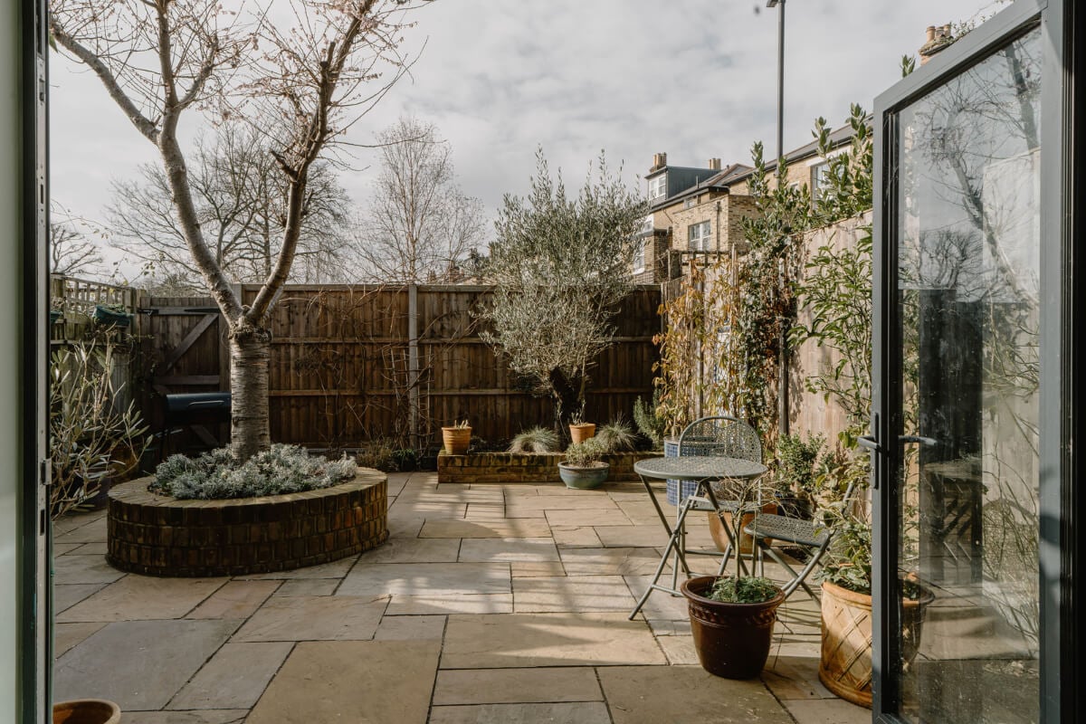 Moroccan-Inspired Designs in a Unique Artist Family Home in London 35 paved garden