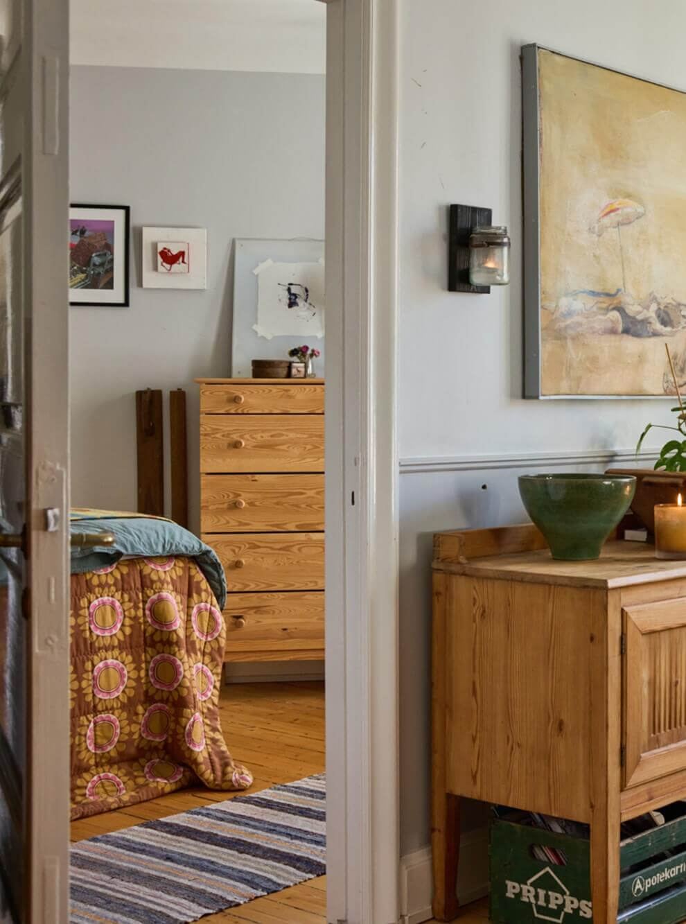 A Charming Apartment with Period Details in Malmö 5 peek into cozy bedroom