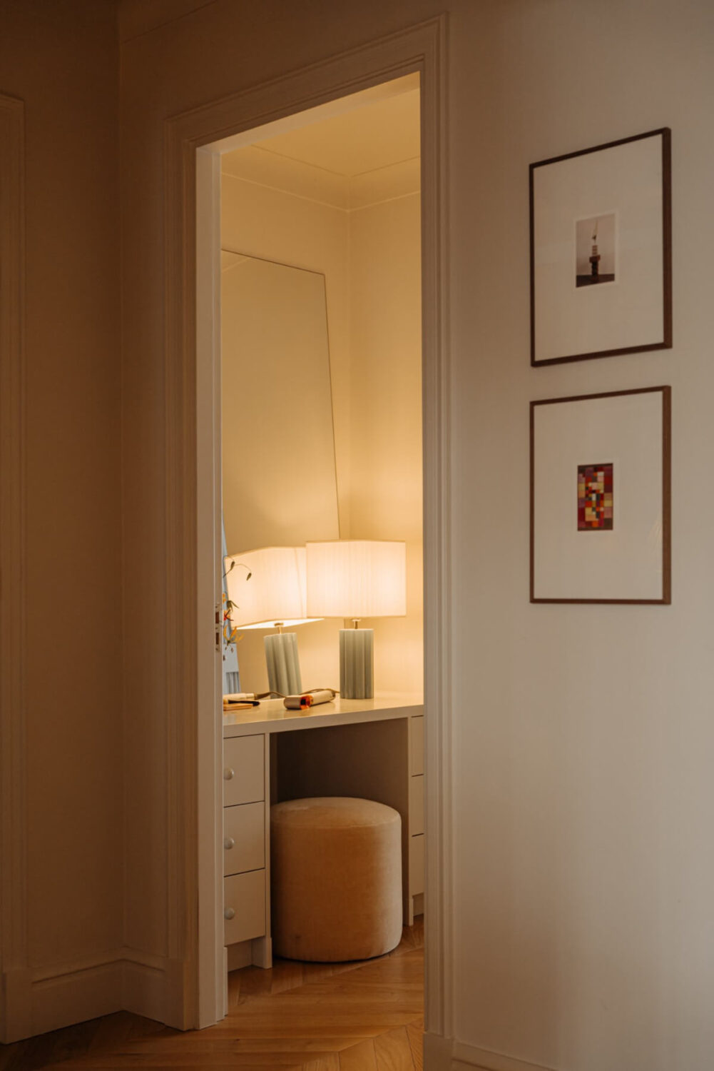 A Luxurious Apartment in Amsterdam with a Lovely Master Suite 10 peek into wardrobe room vanity table