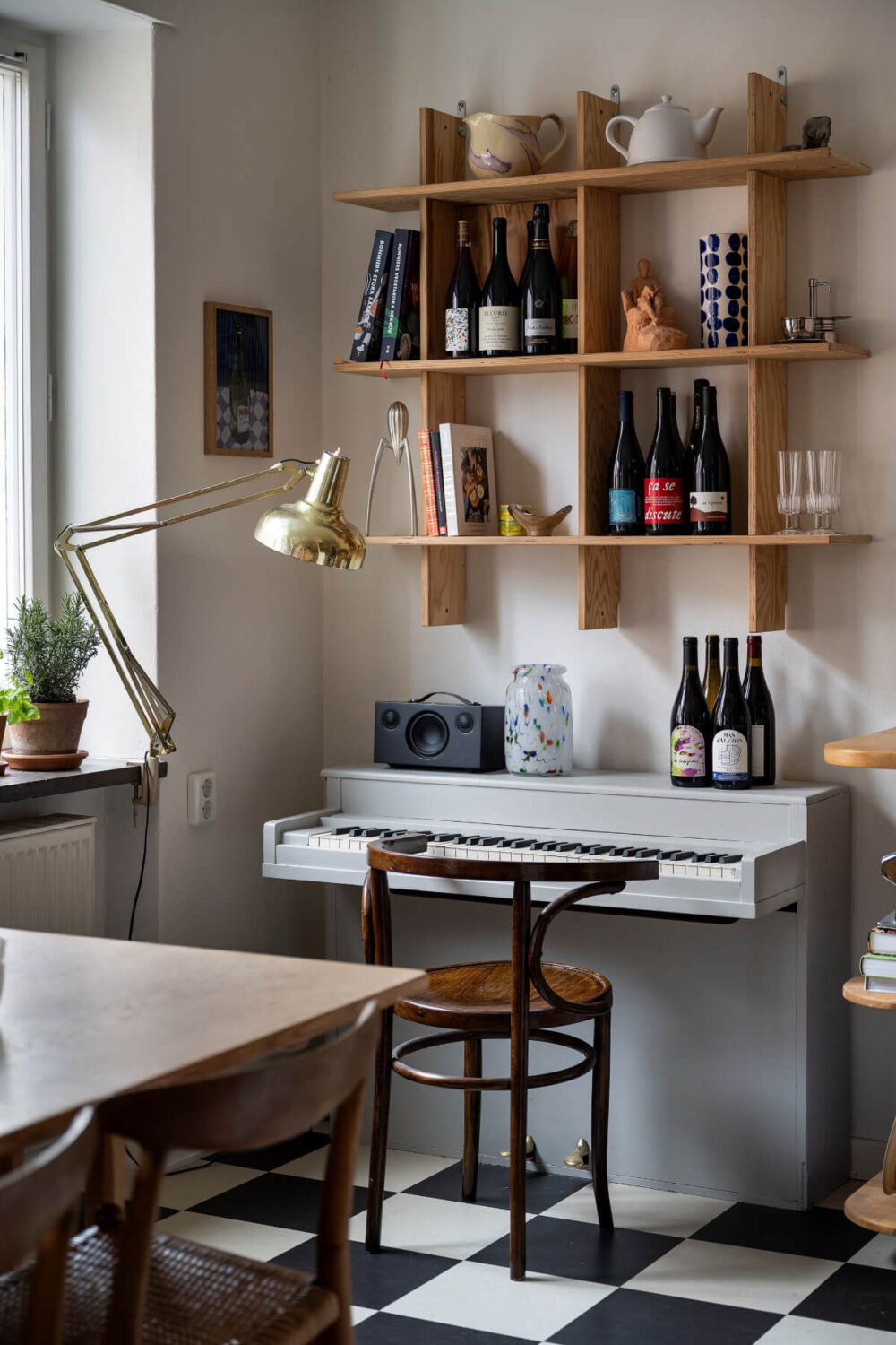 A Studio Apartment with Exposed Brick and Original Details 10 piano space kitchen checkerboard floor