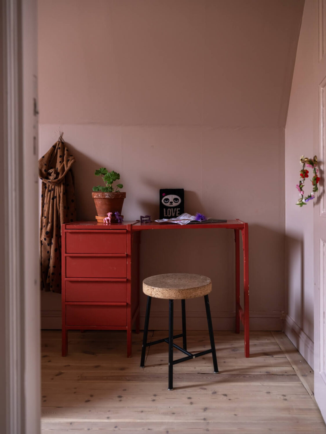 A 1920s Villa Pairs Modern Design and Period Features 28 pink bedroom red desk