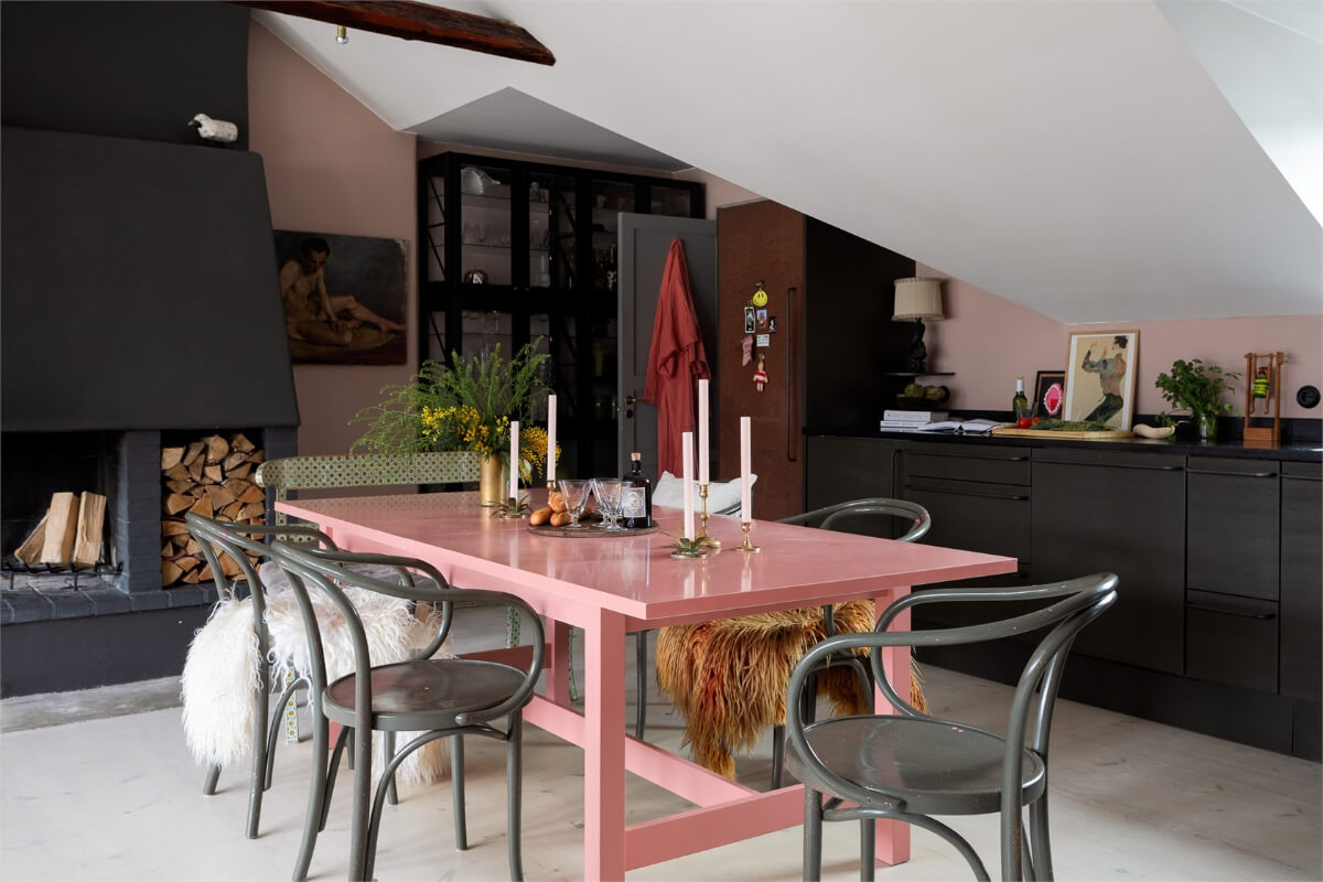 A Colorful Family Attic Apartment in Stockholm 16 pink dining table
