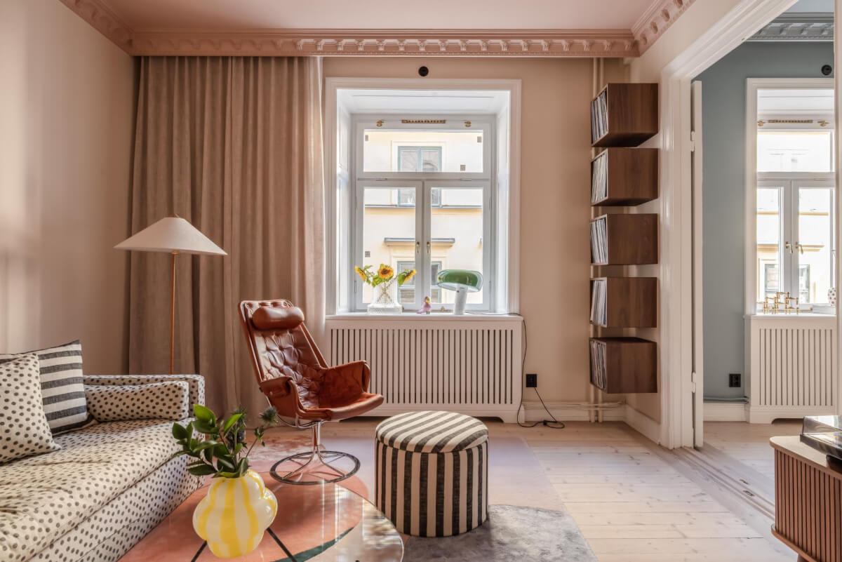 Pastel Colors and Contemporary Design in a Late 19th Century Apartment 2 pink living room dotted sofa