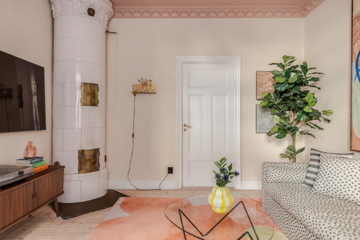 Pastel Colors and Contemporary Design in a Late 19th Century Apartment 3 pink living room fireplace