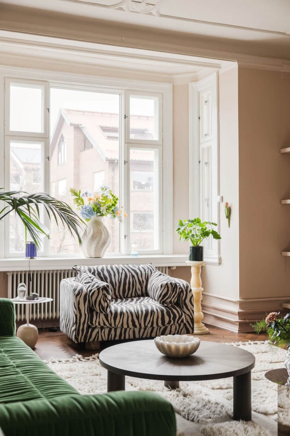 Grand Rooms and Period Features in a Malmö Apartment 4 pink living room large window