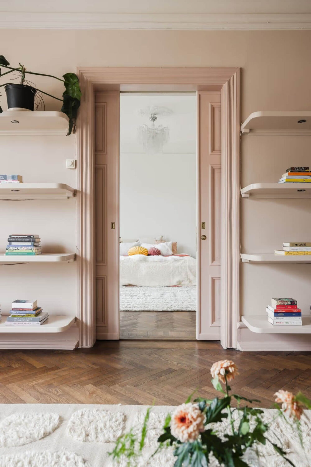 Grand Rooms and Period Features in a Malmö Apartment 16 pink sliding doors