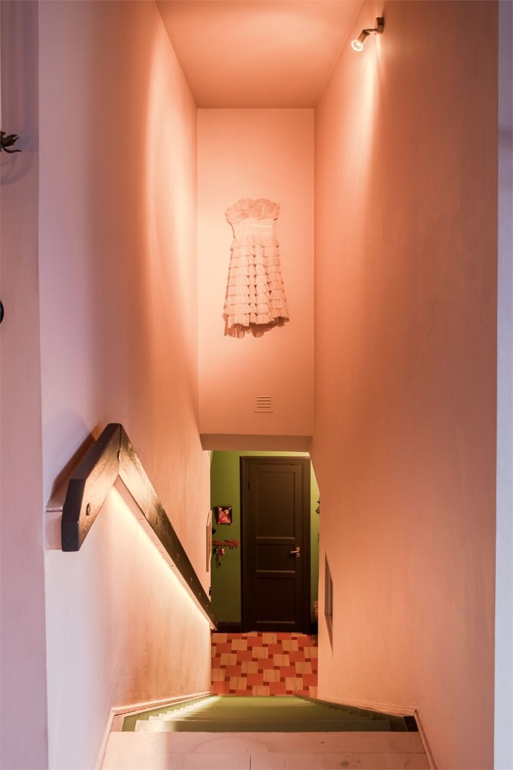A Colorful Family Attic Apartment in Stockholm 33 pink staircase