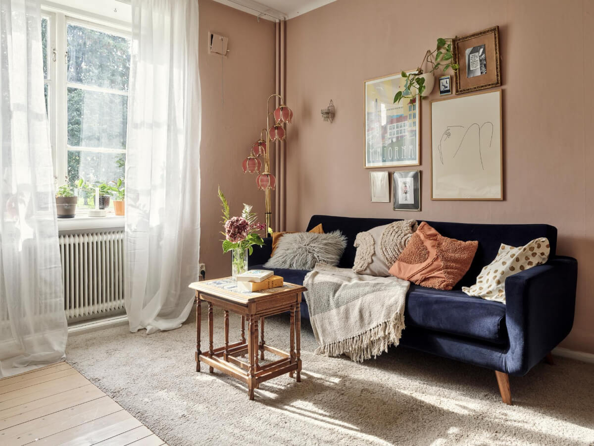 A Pink Ground Floor Studio Apartment with a Large Kitchen 2 pink studio sitting area