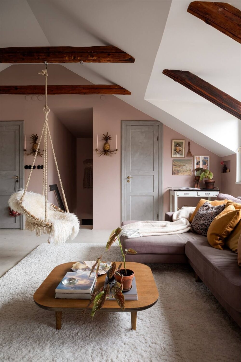 Best of 2025: Living Rooms 13 pink walls attic living room wooden beams