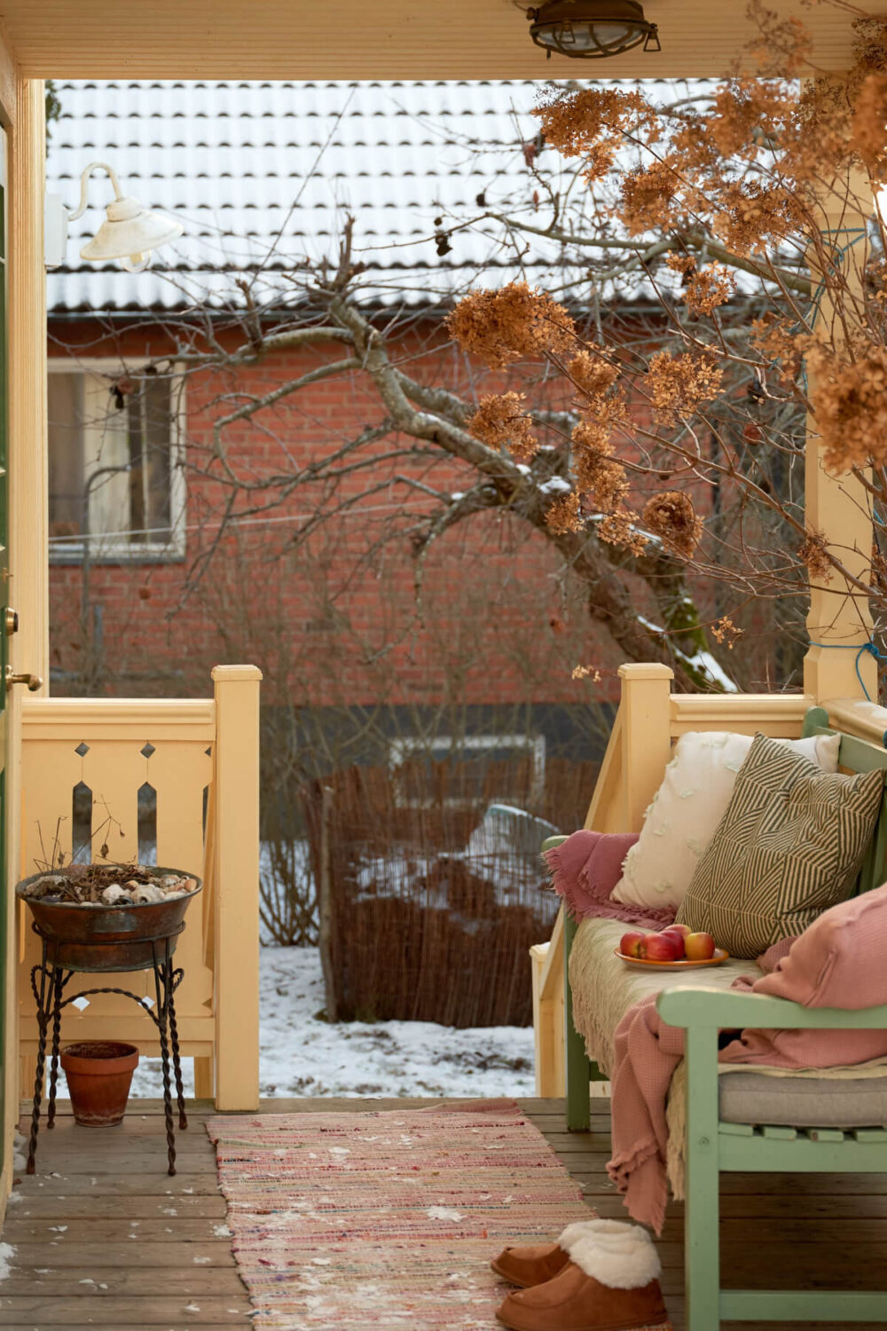 Colorful Interiors in a Wonderful Early 20th Century Swedish Villa 47 porch bench