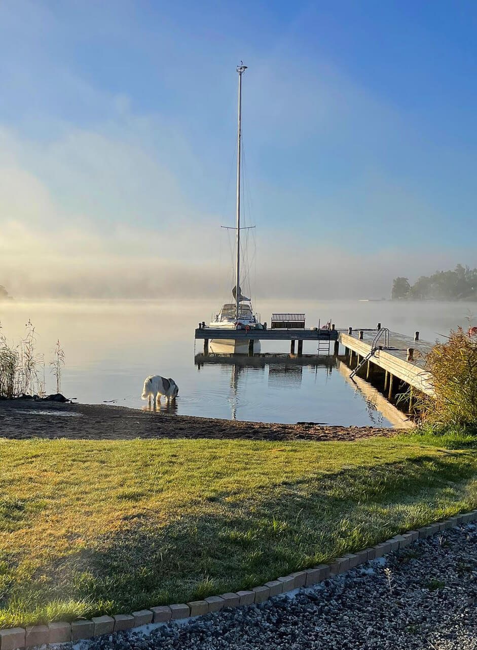 English Manor Style Interiors in a New Swedish Home with Lake Views 28 private pier