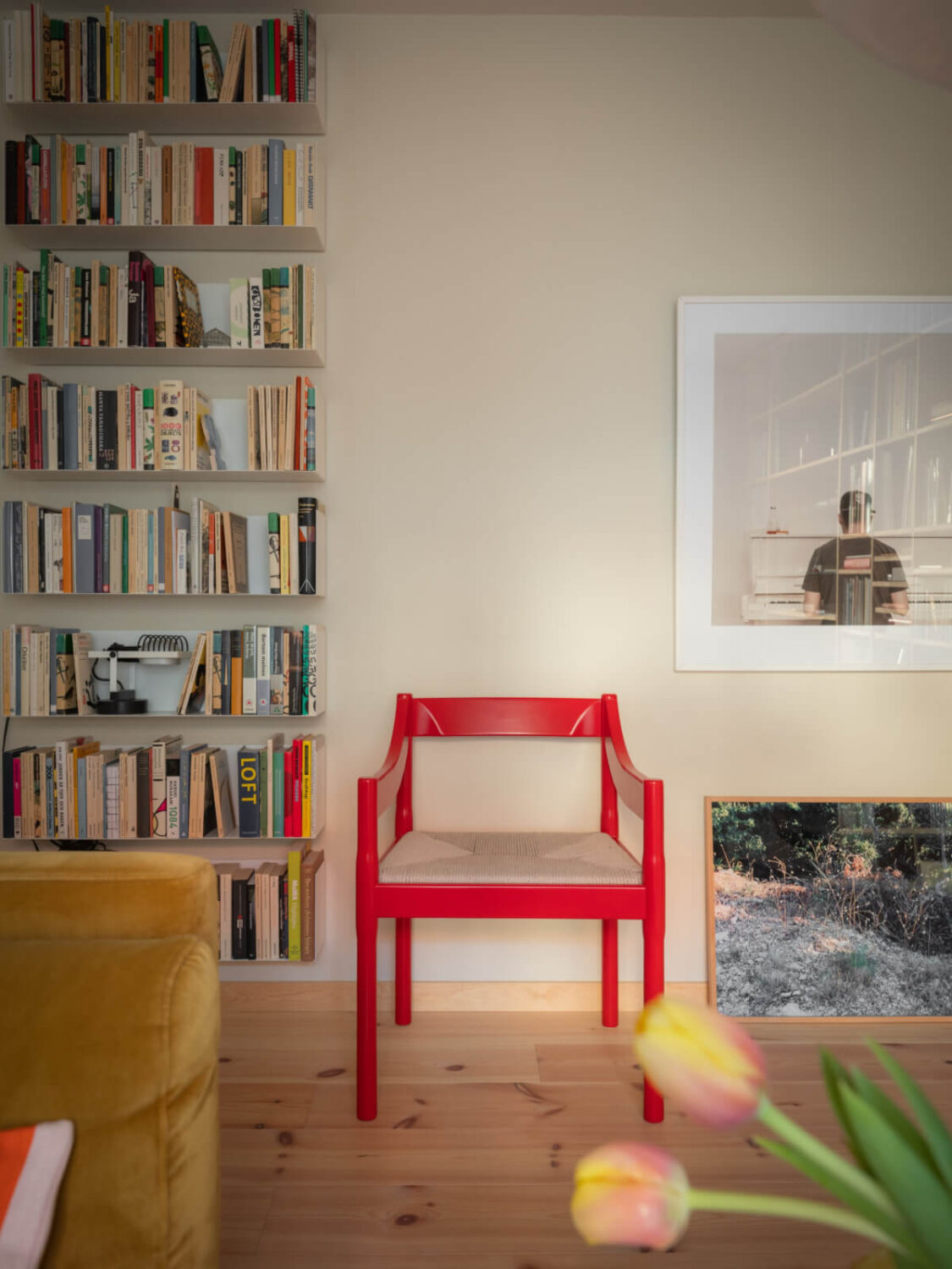 A Design Apartment in an Early 20th Century Building 8 red accent chair