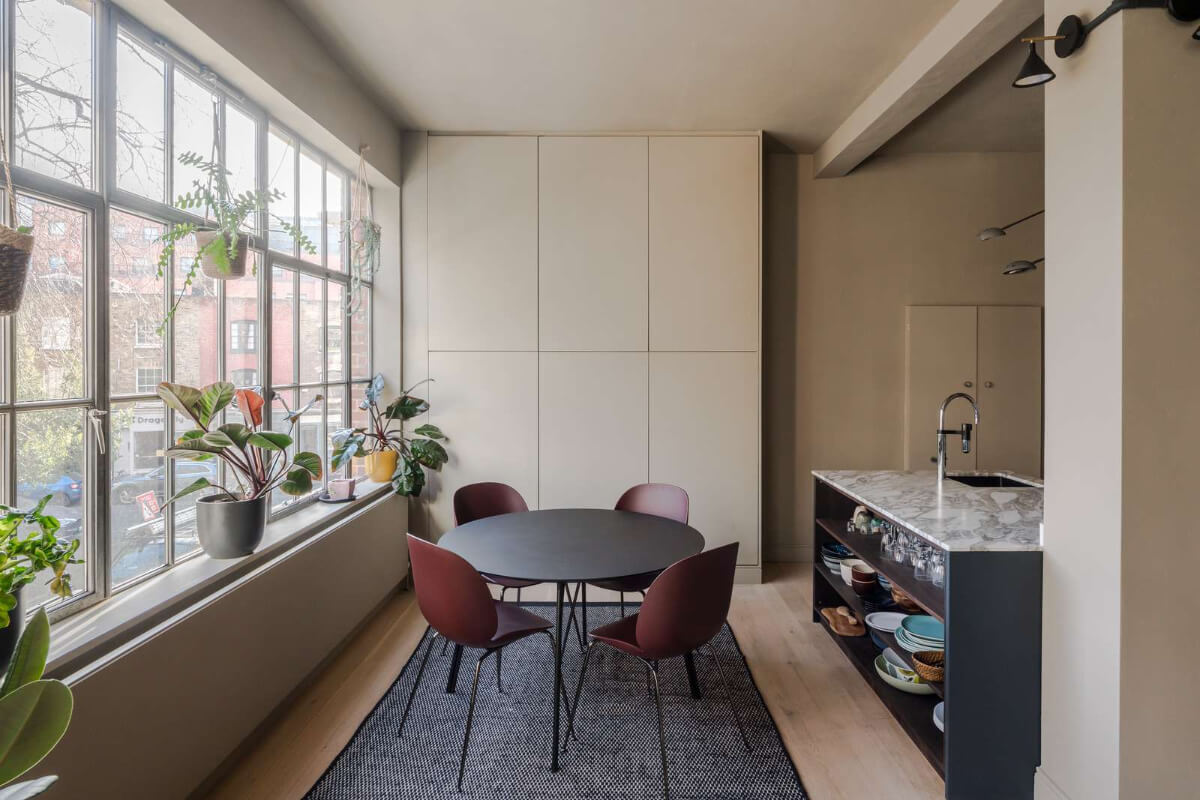 Soft-Colored Contemporary Interiors in a Warehouse Apartment 9 round dining table