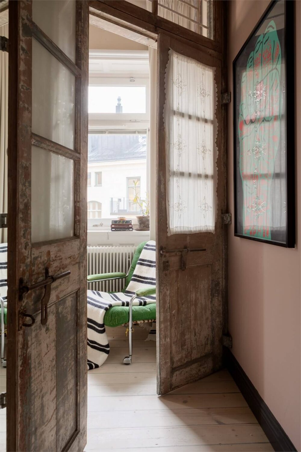 A Colorful Family Attic Apartment in Stockholm 41 rustic doors with lace curtains