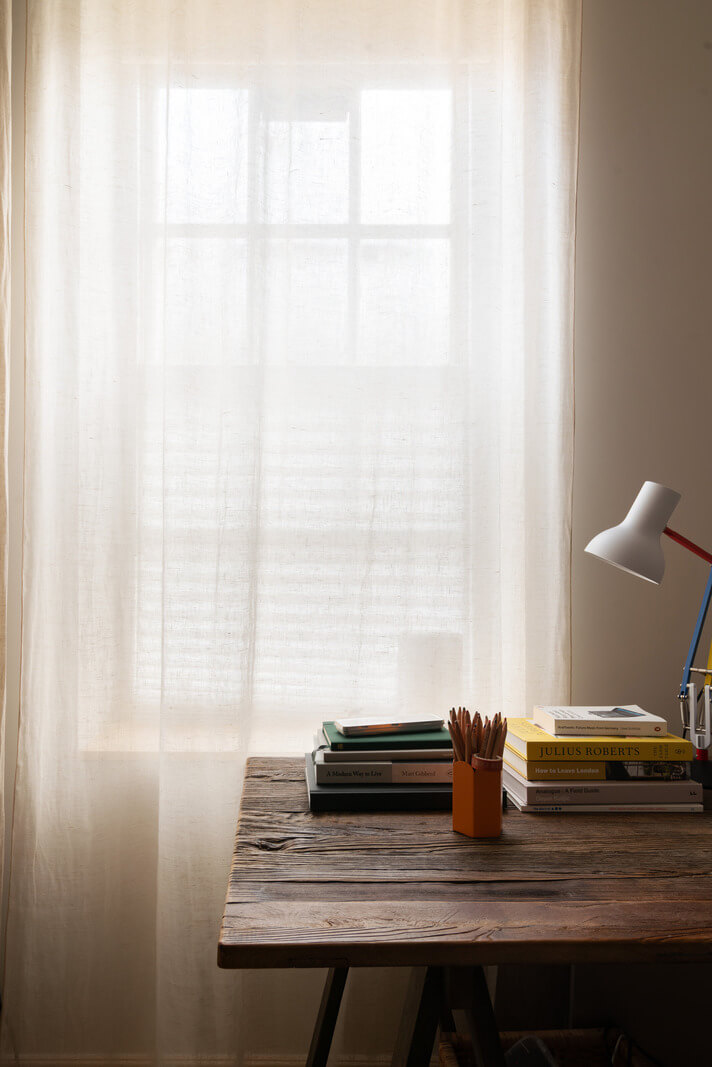 A Tiny Apartment with a Yellow Kitchen in London 11 rustic wooden desk