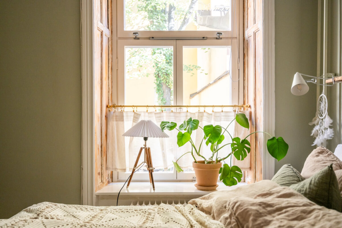 A Cozy Small Apartment with Period Features and Lots of Storage 20 rustic wooden window niche