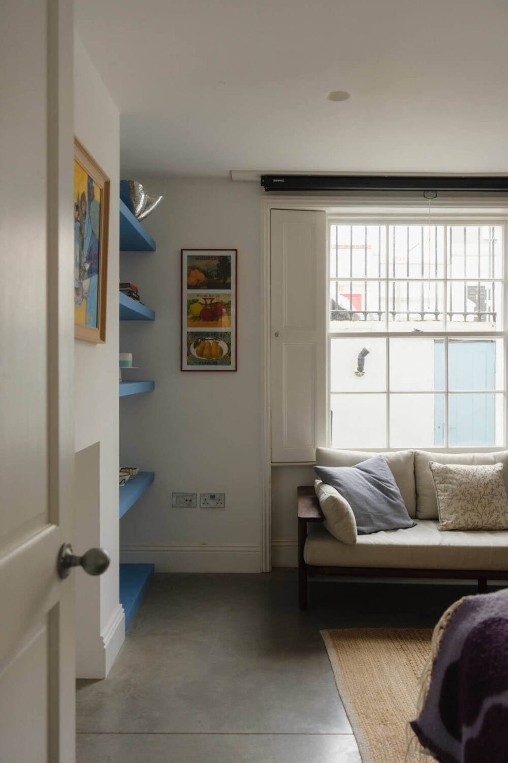 Five-Meter Glazed Garden Doors in an Expanded London Home 14 sitting room blue shelves