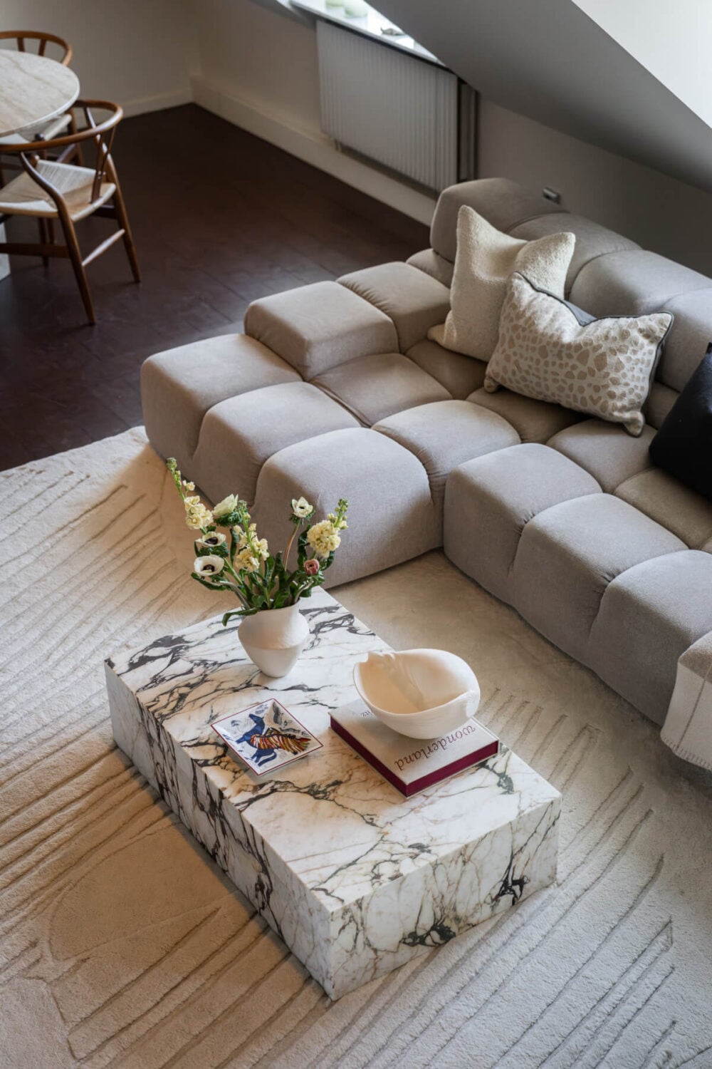 A Light Penthouse Apartment with Built-In Bookshelves 5 sitting room marble coffee table